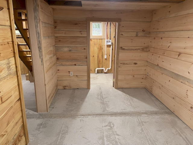 144 Redneck Rd, Starks, ME 04911 - spare room with wooden walls and stairs