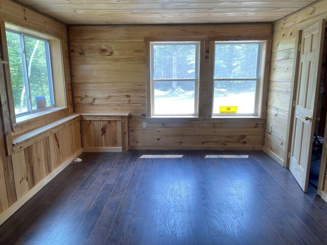 144 Redneck Rd, Starks, ME 04911 - empty room featuring wooden walls, dark wood finished floors, and wooden ceiling