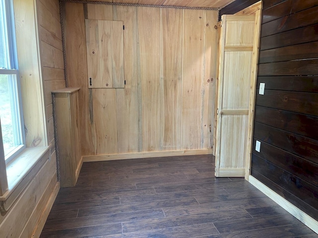 144 Redneck Rd, Starks, ME 04911 - unfurnished room with dark wood finished floors and wood walls