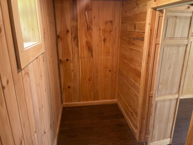 144 Redneck Rd, Starks, ME 04911 - hallway featuring wooden walls and dark wood finished floors
