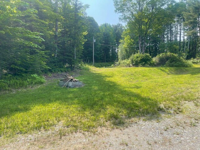 144 Redneck Rd, Starks, ME 04911 - view of yard with a forest view