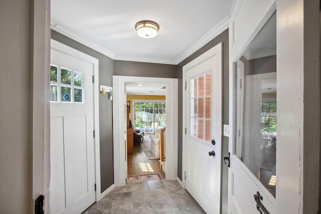 entrance foyer featuring ornamental molding