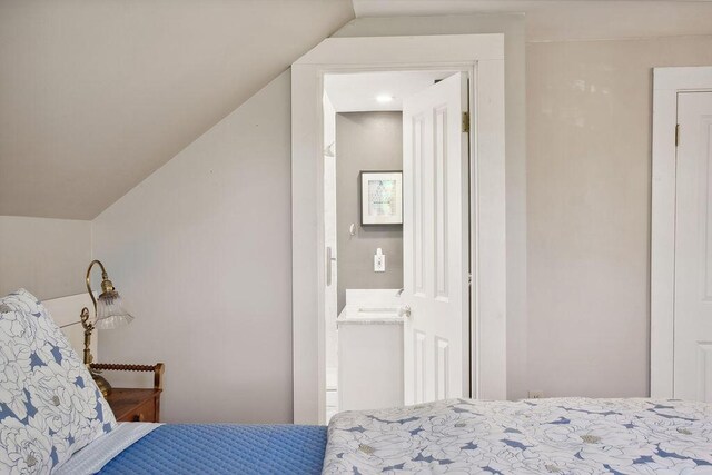 bedroom with vaulted ceiling