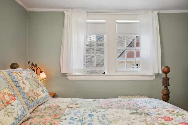 bedroom featuring crown molding