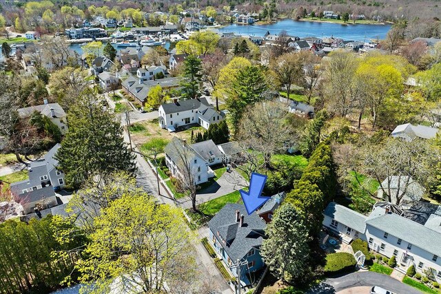 aerial view featuring a residential view and a water view