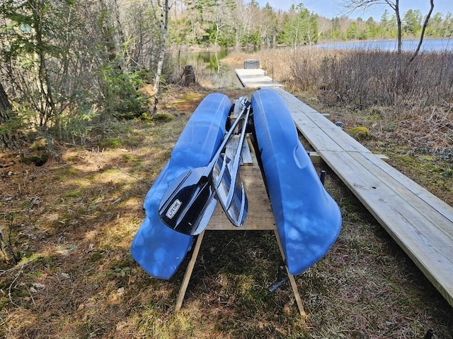 view of storm shelter with a water view