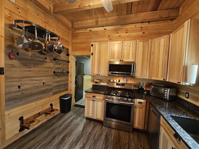 kitchen with appliances with stainless steel finishes, a toaster, wooden ceiling, a sink, and beamed ceiling