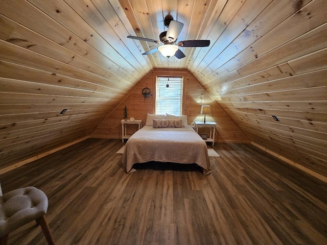 bedroom with wood walls, dark wood-type flooring, wooden ceiling, a ceiling fan, and vaulted ceiling