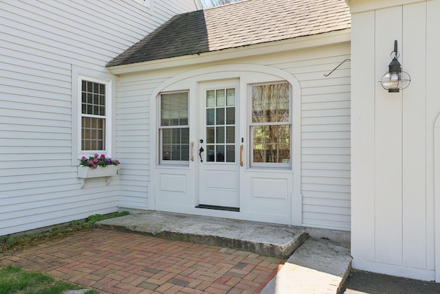 33 Smith Rd, Hallowell, ME 04347 - doorway to property with a shingled roof