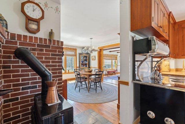 33 Smith Rd, Hallowell, ME 04347 - dining space with an inviting chandelier and light wood-type flooring