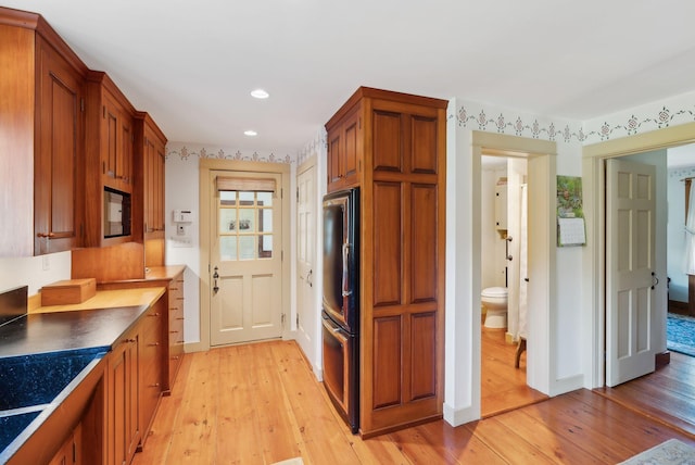 33 Smith Rd, Hallowell, ME 04347 - kitchen featuring brown cabinetry, recessed lighting, light wood finished floors, black microwave, and baseboards