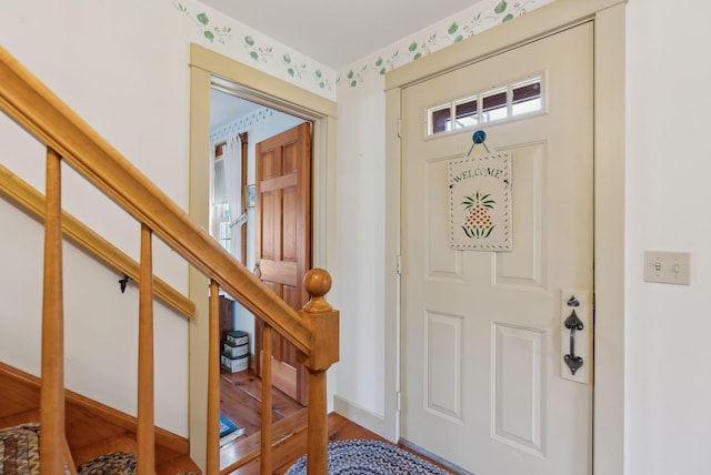33 Smith Rd, Hallowell, ME 04347 - entrance foyer featuring stairs and wood finished floors