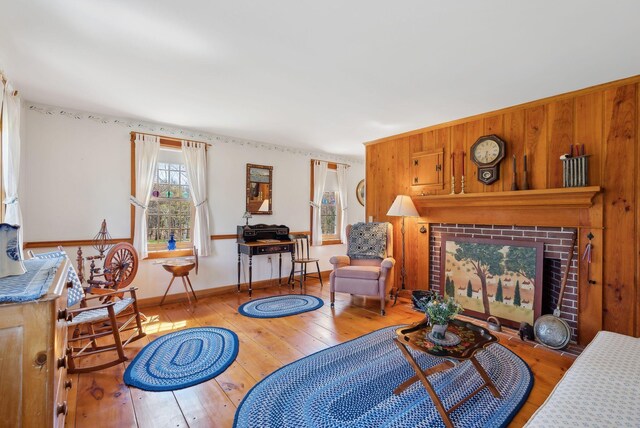 33 Smith Rd, Hallowell, ME 04347 - living area featuring a fireplace, baseboards, and wood-type flooring