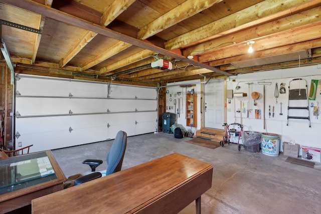33 Smith Rd, Hallowell, ME 04347 - garage featuring a garage door opener