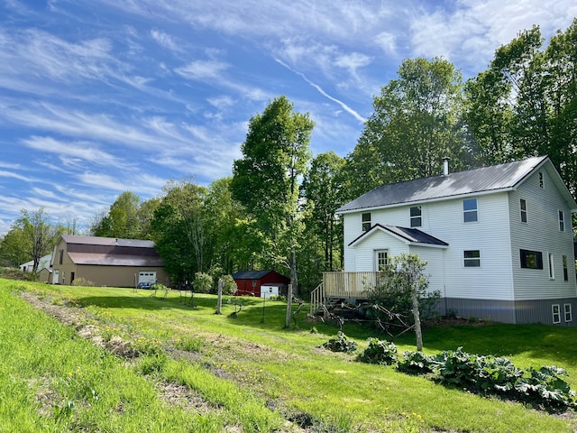 142 Palmer Rd, Thorndike, ME 04986 - view of grassy yard with a deck