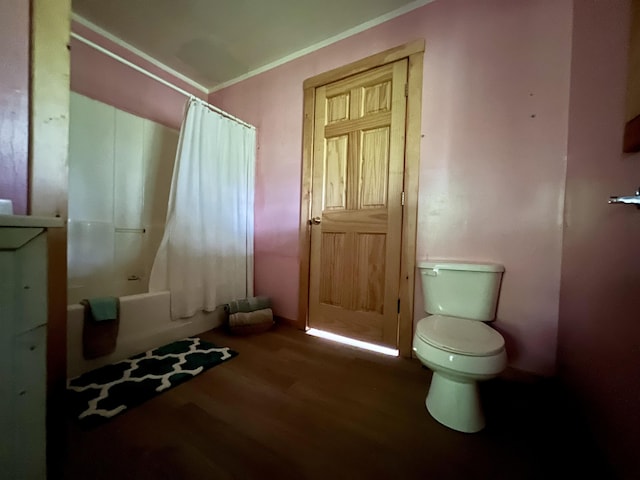 142 Palmer Rd, Thorndike, ME 04986 - bathroom with wood finished floors, shower / bathtub combination with curtain, and ornamental molding