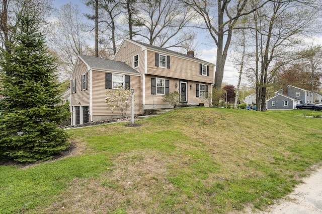 13 Juniper Ln, Cape Elizabeth, ME 04107 - colonial house featuring a chimney and a front yard