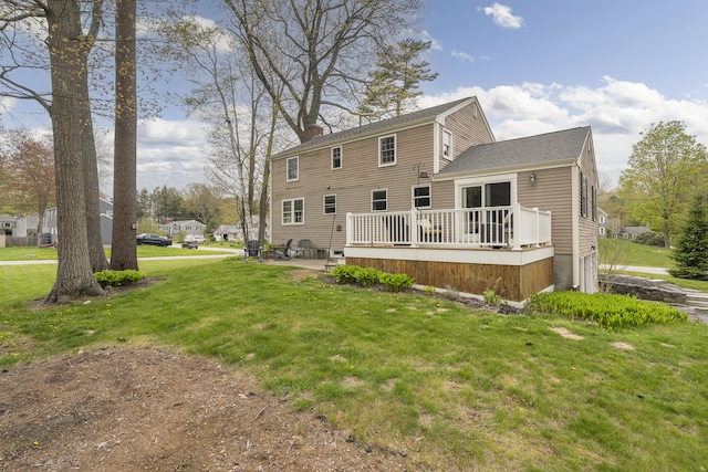13 Juniper Ln, Cape Elizabeth, ME 04107 - back of property featuring a deck, a lawn, a chimney, a patio area, and a shingled roof