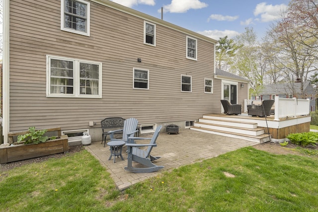 13 Juniper Ln, Cape Elizabeth, ME 04107 - back of property featuring a yard, a patio area, and a deck