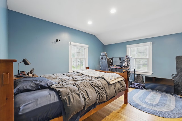 13 Juniper Ln, Cape Elizabeth, ME 04107 - bedroom with multiple windows, vaulted ceiling, wood finished floors, and recessed lighting