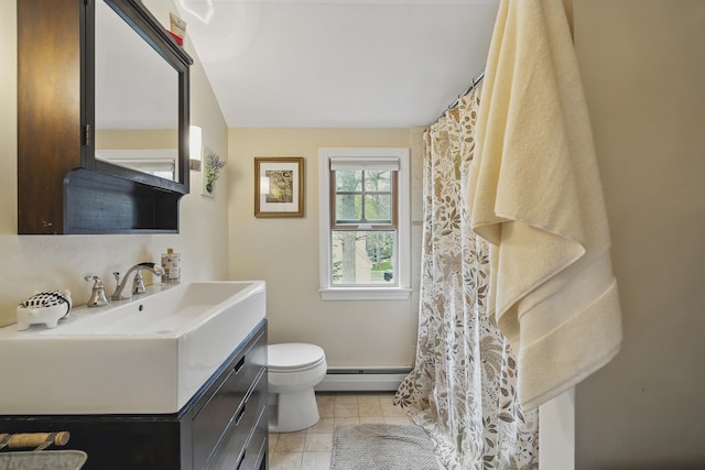 13 Juniper Ln, Cape Elizabeth, ME 04107 - bathroom with a baseboard heating unit, toilet, vanity, and vaulted ceiling