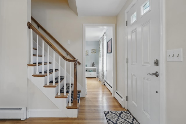 13 Juniper Ln, Cape Elizabeth, ME 04107 - entryway with a baseboard heating unit, wood finished floors, and stairway
