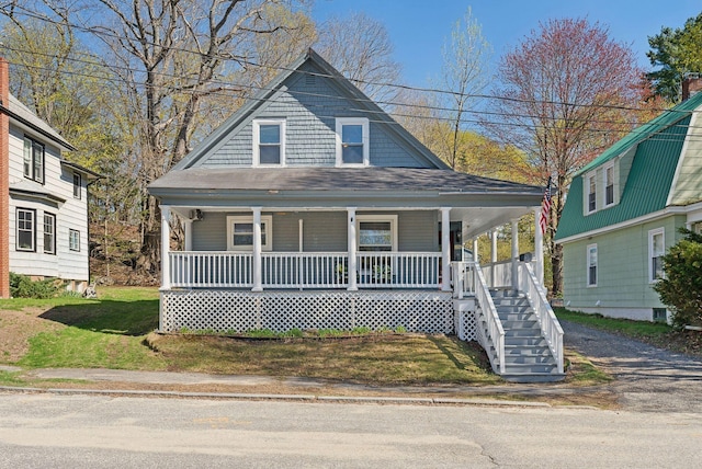 farmhouse featuring covered porch
