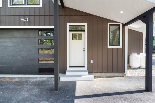 676 Sebago Rd, Sebago, ME 04029 - entrance to property with board and batten siding