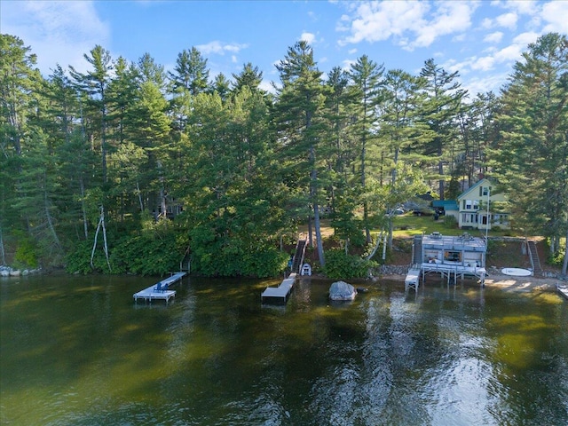 676 Sebago Rd, Sebago, ME 04029 - property view of water with a dock