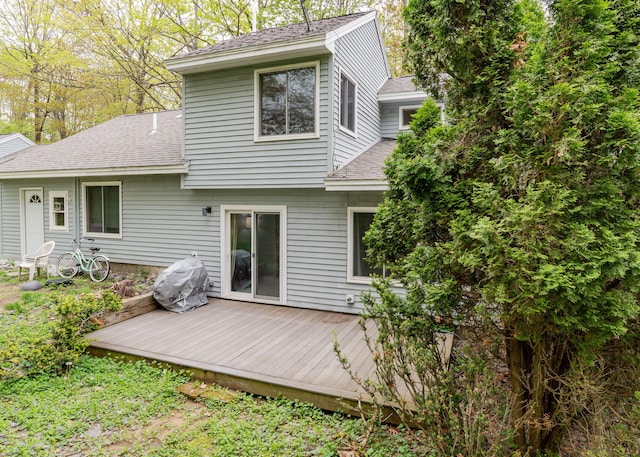 135 Portland Ave Unit 803, Old Orchard Beach, ME 04064 - rear view of property featuring a shingled roof and a deck