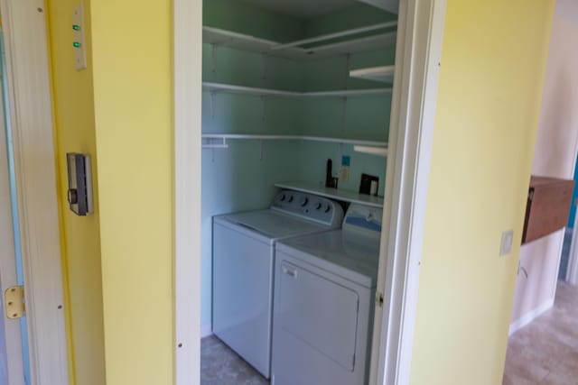 laundry room with washer and clothes dryer