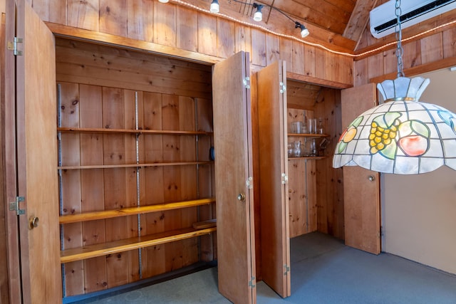room details with carpet flooring and a wall unit AC