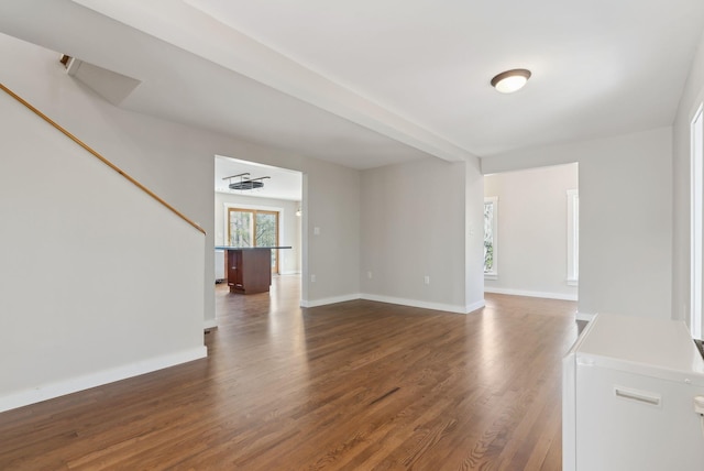 27 Rein Rd, Saint George, ME 04859 - unfurnished living room featuring stairs, baseboards, and wood finished floors