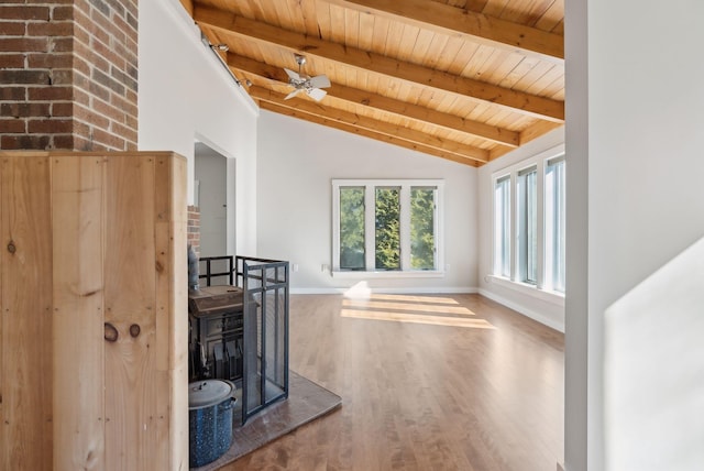 27 Rein Rd, Saint George, ME 04859 - unfurnished living room featuring wood ceiling, baseboards, lofted ceiling with beams, and wood finished floors