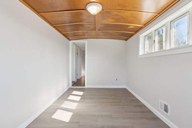 27 Rein Rd, Saint George, ME 04859 - spare room featuring baseboards, visible vents, wood ceiling, and light wood-style flooring