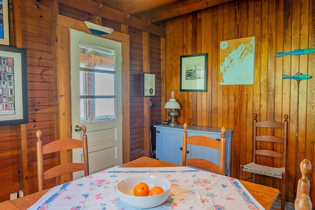 bedroom with wooden walls