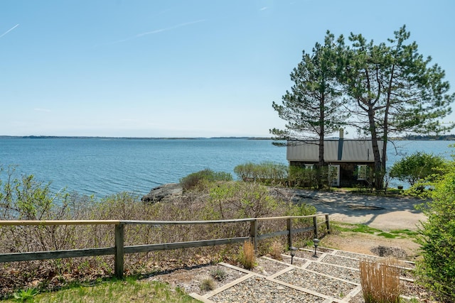 water view featuring fence