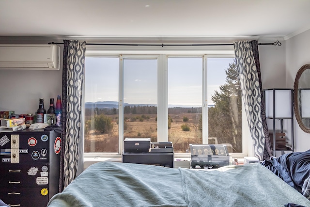 361 Sedgwick Ridge Rd, Sedgwick, ME 04676 - bedroom with ornamental molding and a wall mounted AC
