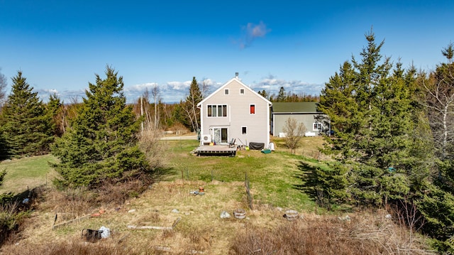 361 Sedgwick Ridge Rd, Sedgwick, ME 04676 - rear view of house with a yard and a wooden deck