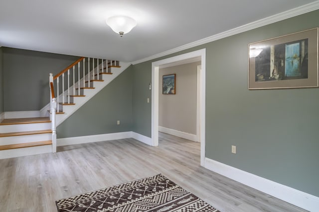 361 Sedgwick Ridge Rd, Sedgwick, ME 04676 - basement with crown molding, wood finished floors, and stairs