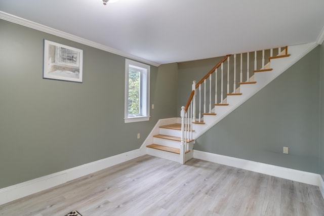 361 Sedgwick Ridge Rd, Sedgwick, ME 04676 - stairs featuring wood finished floors and ornamental molding