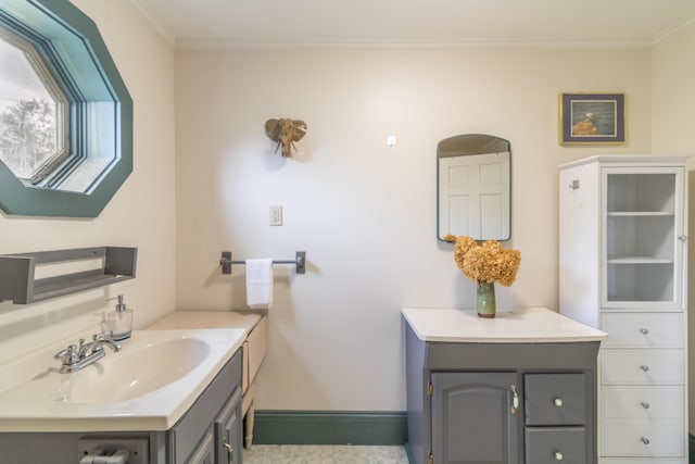 361 Sedgwick Ridge Rd, Sedgwick, ME 04676 - bathroom featuring crown molding and vanity