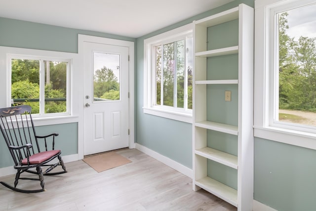 361 Sedgwick Ridge Rd, Sedgwick, ME 04676 - doorway to outside featuring healthy amount of natural light and light wood-style flooring