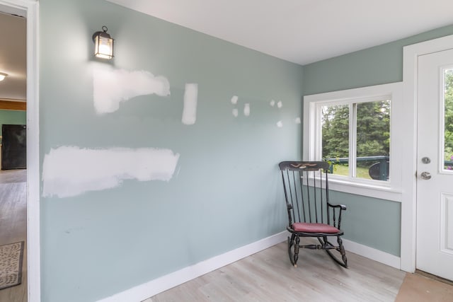 361 Sedgwick Ridge Rd, Sedgwick, ME 04676 - sitting room featuring wood finished floors and baseboards