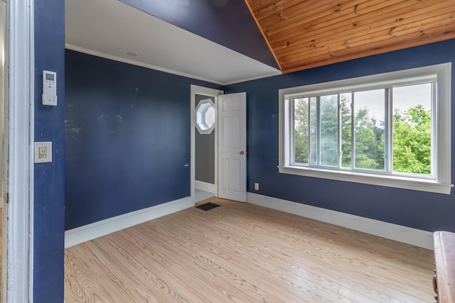361 Sedgwick Ridge Rd, Sedgwick, ME 04676 - unfurnished room featuring vaulted ceiling, wood finished floors, ornamental molding, and wooden ceiling