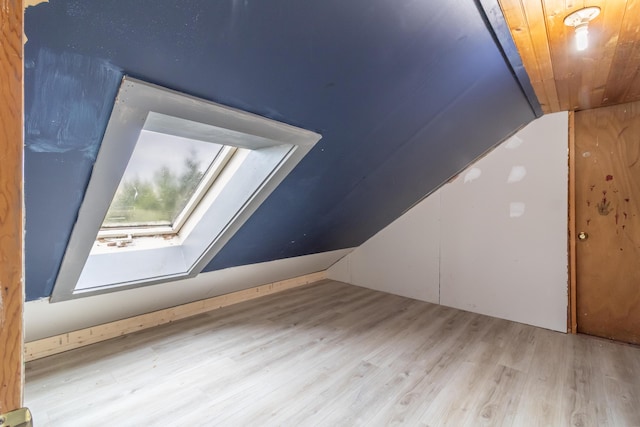 361 Sedgwick Ridge Rd, Sedgwick, ME 04676 - bonus room featuring vaulted ceiling, a skylight, and wood finished floors
