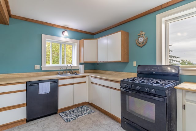 361 Sedgwick Ridge Rd, Sedgwick, ME 04676 - kitchen with black appliances, light countertops, and white cabinets