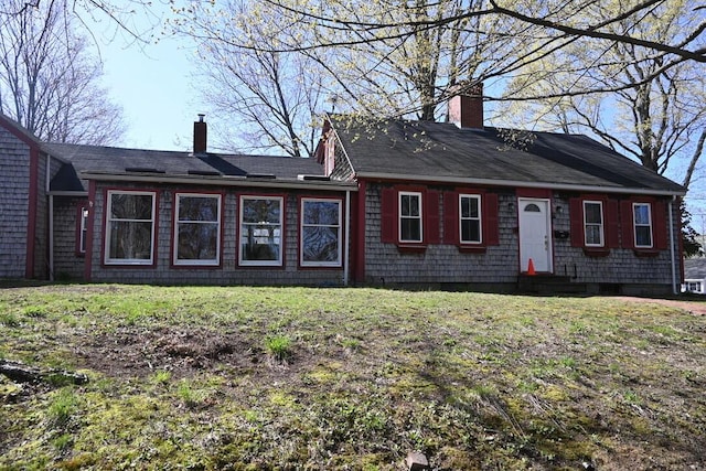 104 Northern Ave, Gardiner, ME 04345 - back of property with a lawn and a chimney