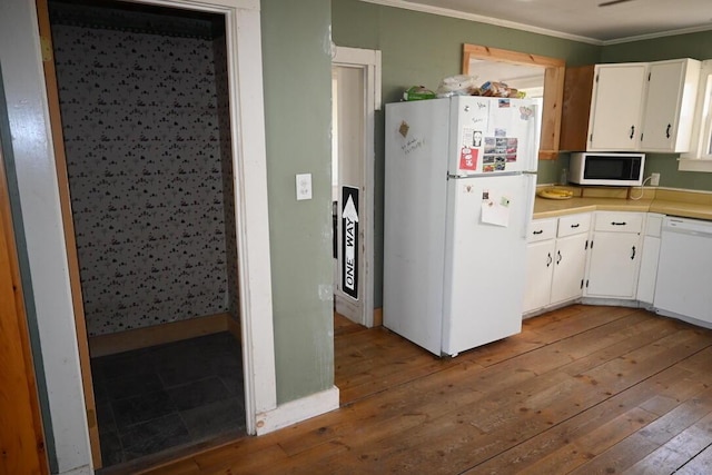 104 Northern Ave, Gardiner, ME 04345 - kitchen with ornamental molding, wood-type flooring, white appliances, and white cabinets