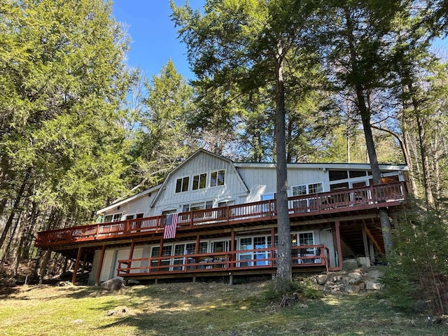 back of property with a deck
